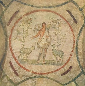 The Good Shepherd (Catacomb of Priscilla, 3rd century). The earliest image of Christ — not a fearsome Almighty but a young shepherd with a sheep on his shoulders, painted on the ceiling of a burial chamber. The Church of the catacombs: no power, no property — only love.